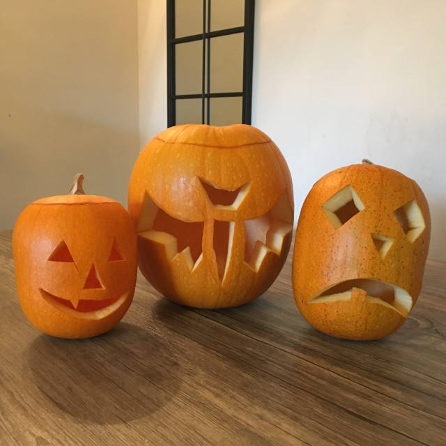 Three carved pumpkins