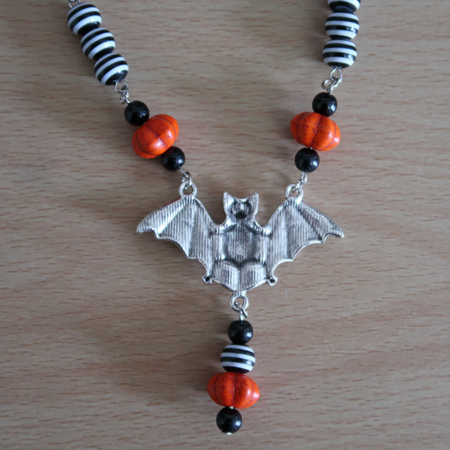 Striped bat necklace (reverse view)