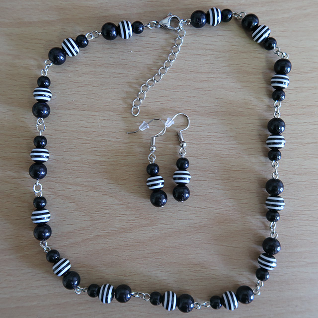 Necklace and earrings (overhead view, variation 2)