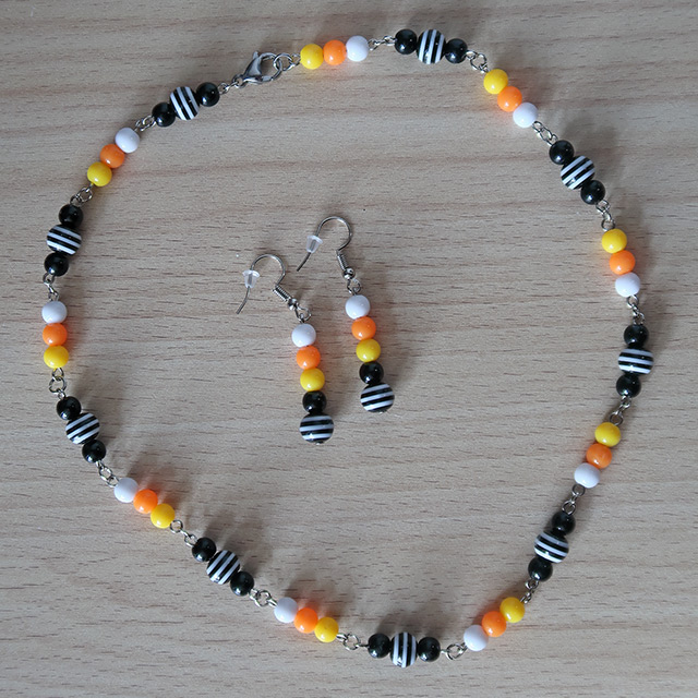 Striped Candy Corn necklace and earrings (overhead view)